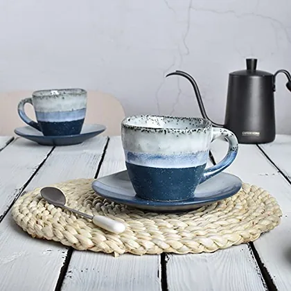 A Bosmarlin mug in a reactive glaze