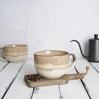 A Bosmarlin mug in a reactive glaze