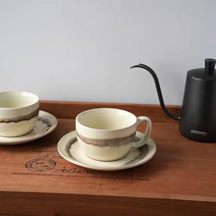 A Bosmarlin mug in a reactive glaze