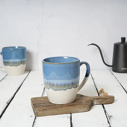 A Bosmarlin mug in a reactive glaze