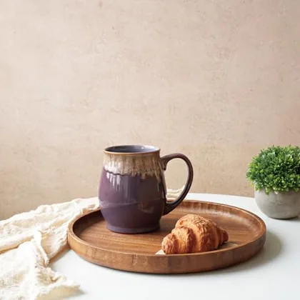 A Bosmarlin mug in a reactive glaze