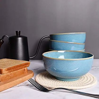 A Bosmarlin mug in a reactive glaze