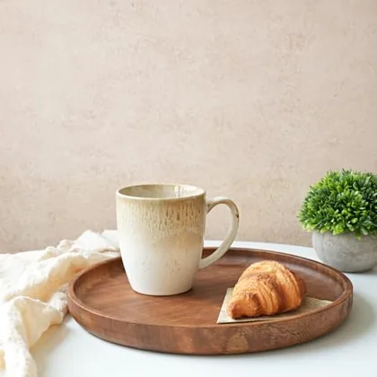 A Bosmarlin mug in a reactive glaze