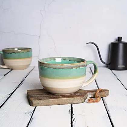 A Bosmarlin mug in a reactive glaze