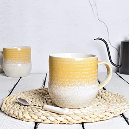 A Bosmarlin mug in a reactive glaze
