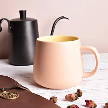 A Bosmarlin mug in a reactive glaze