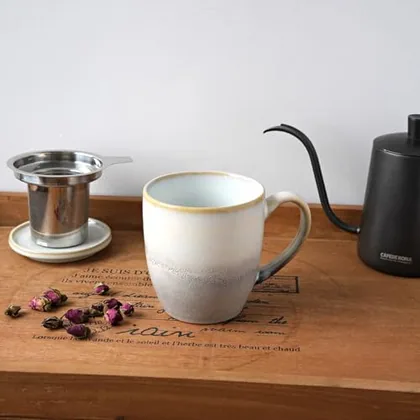 A Bosmarlin mug in a reactive glaze