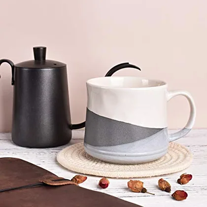 A Bosmarlin mug in a reactive glaze