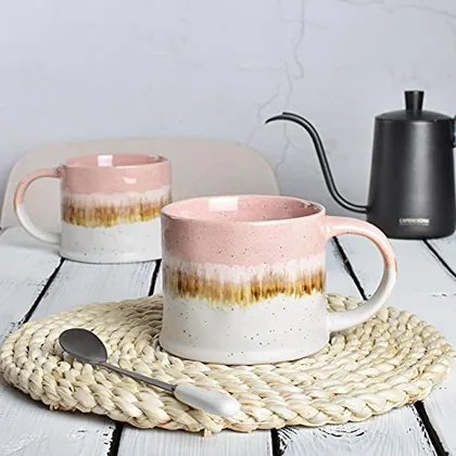 A Bosmarlin mug in a reactive glaze