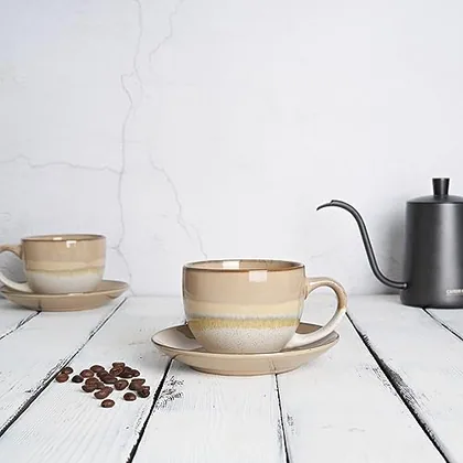 A Bosmarlin mug in a reactive glaze