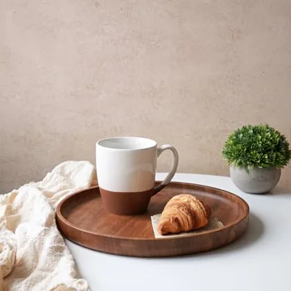 A Bosmarlin mug in a reactive glaze