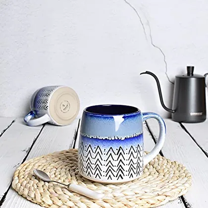 A Bosmarlin mug in a reactive glaze