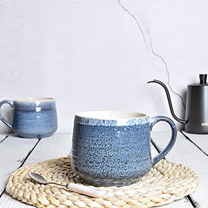 A Bosmarlin mug in a reactive glaze