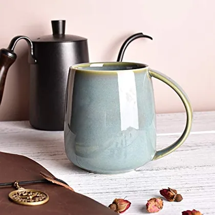A Bosmarlin mug in a reactive glaze