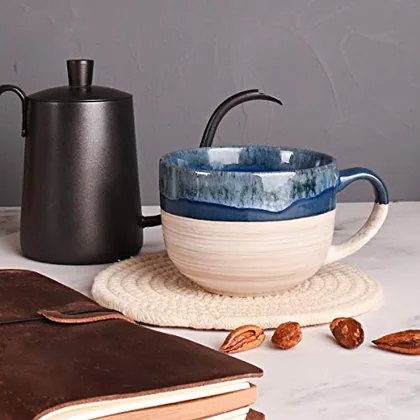 A Bosmarlin mug in a reactive glaze
