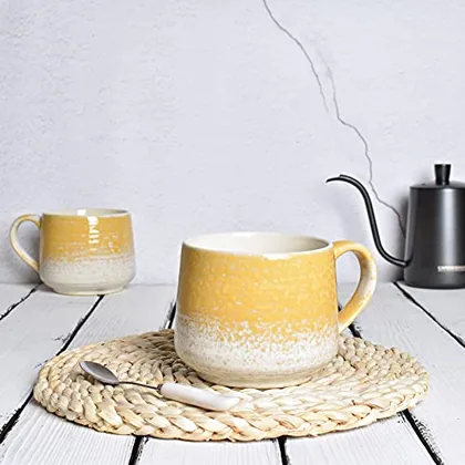 A Bosmarlin mug in a reactive glaze