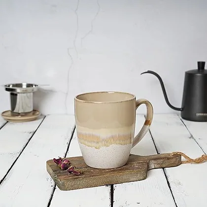 A Bosmarlin mug in a reactive glaze