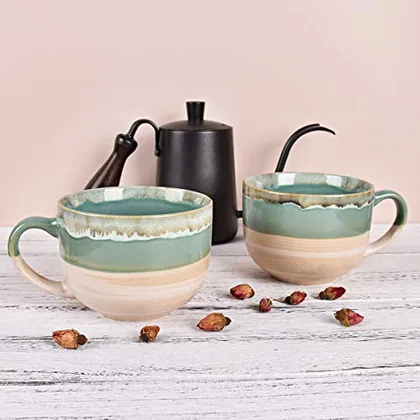 A Bosmarlin mug in a reactive glaze