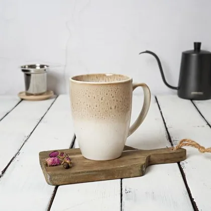 A Bosmarlin mug in a reactive glaze