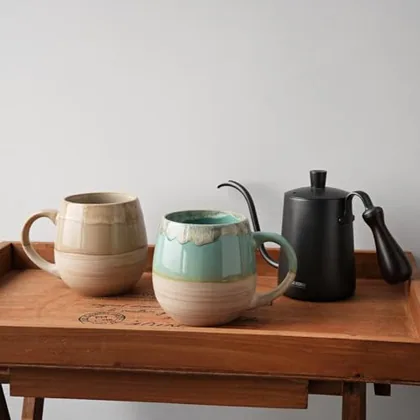 A Bosmarlin mug in a reactive glaze