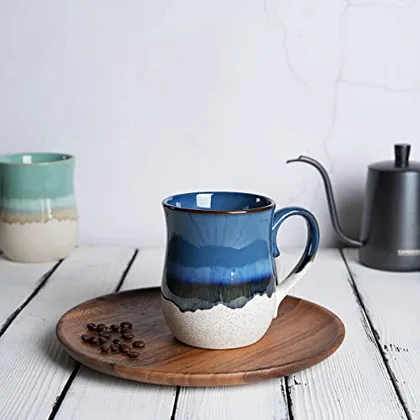 A Bosmarlin mug in a reactive glaze