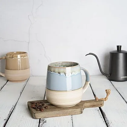 A Bosmarlin mug in a reactive glaze