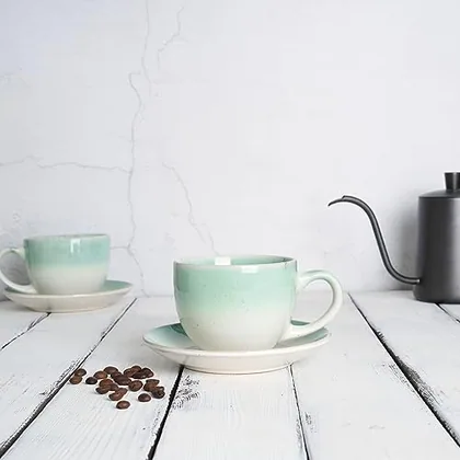A Bosmarlin mug in a reactive glaze
