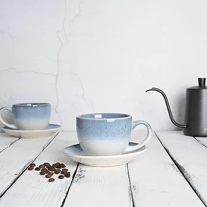 A Bosmarlin mug in a reactive glaze