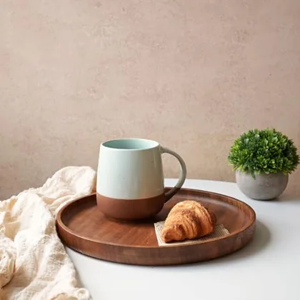 A Bosmarlin mug in a reactive glaze