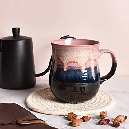 A Bosmarlin mug in a reactive glaze