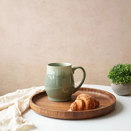 A Bosmarlin mug in a reactive glaze
