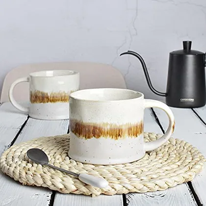 A Bosmarlin mug in a reactive glaze