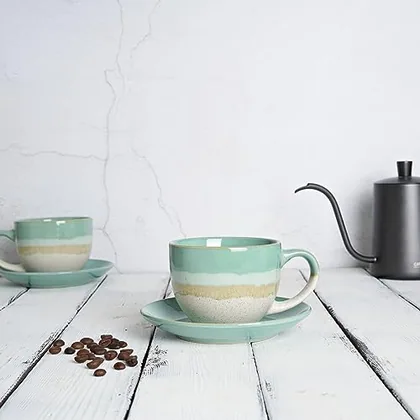 A Bosmarlin mug in a reactive glaze