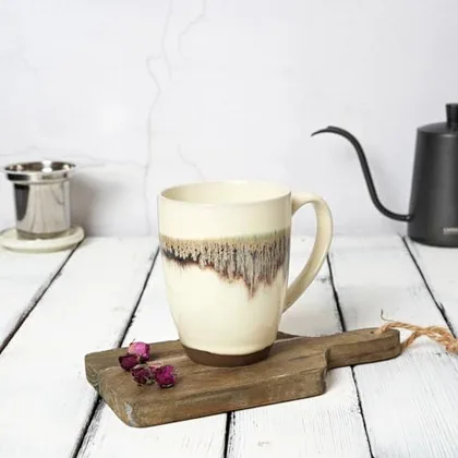 A Bosmarlin mug in a reactive glaze