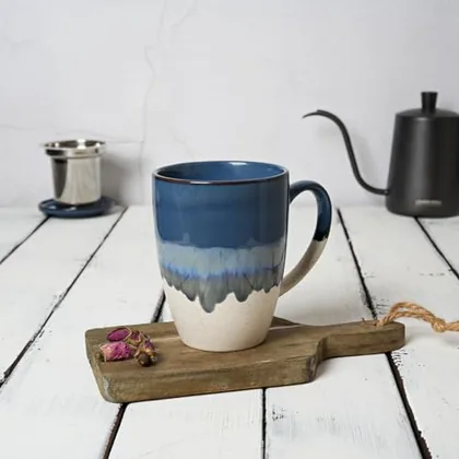 A Bosmarlin mug in a reactive glaze