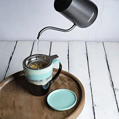 A Bosmarlin mug in a reactive glaze