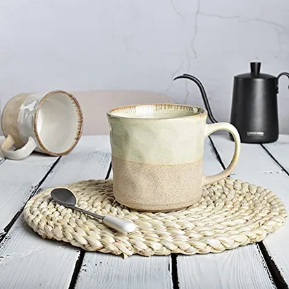 A Bosmarlin mug in a reactive glaze